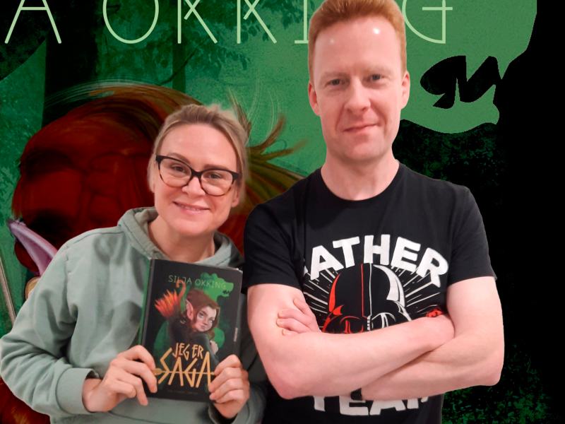 Silja og Bjarne ved siden af hinanden med Siljas bog i bog i baggrunden